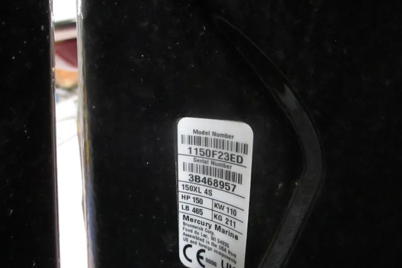 Slide: The Image of Label on a 2024 Tahoe 200 S, displaying model and serial numbers. - 28