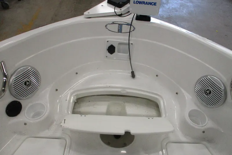 Slide: The Image of 2024 Tahoe 200 S boat interior with speakers and Lowrance equipment. - 7