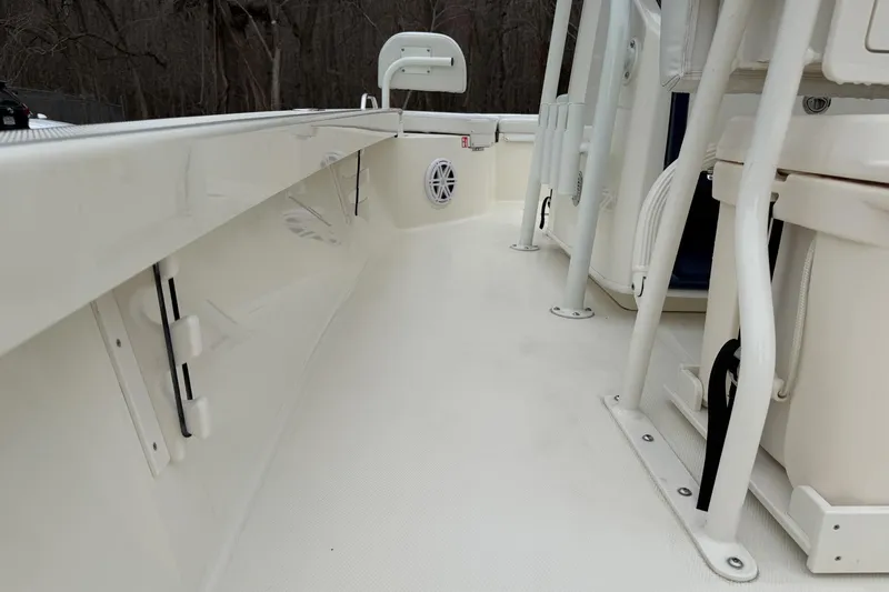 Slide: The Image of 2026 Pathfinder 2200 TRS boat interior, featuring seating and storage compartments. - 17
