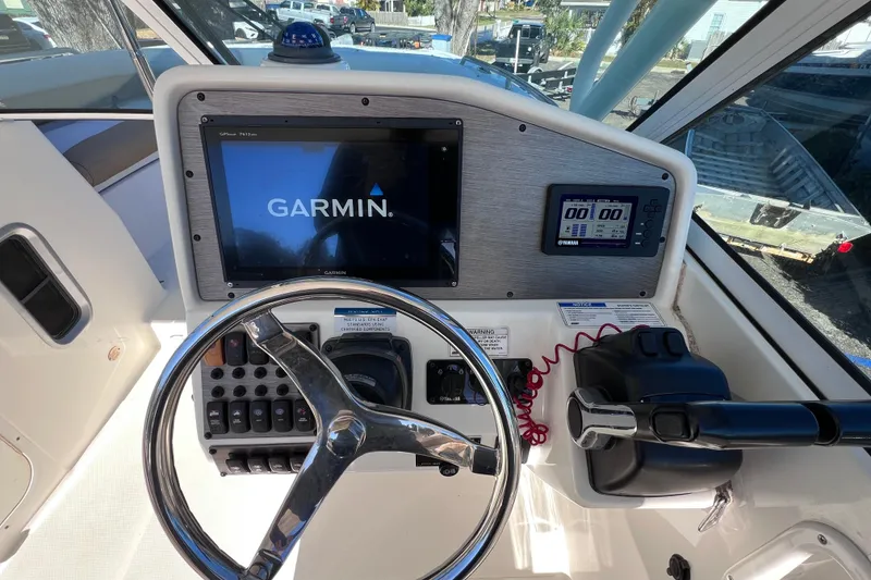 Slide: The Image of 2017 World Cat Glacier Bay Edition 2740 Dual Console helm with Garmin navigation system. - 30