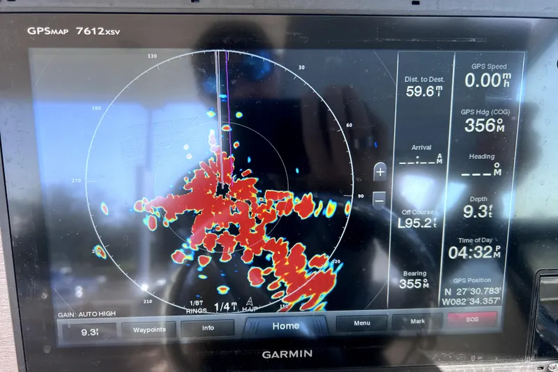 Slide: The Image of Garmin GPS display on 2017 World Cat Glacier Bay Edition 2740, showing radar and navigation data. - 36