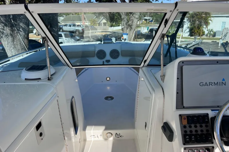 Slide: The Image of 2017 World Cat Glacier Bay Edition 2740 Dual Console boat interior with Garmin navigation system. - 39