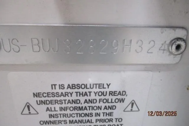 Slide: The Image of 2024 Tahoe 2150 CC boat identification plate with safety instructions and date stamp. - 9