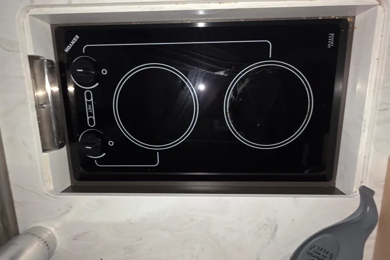 Slide: The Image of Built-in stovetop on 2020 Tiara Yachts F44 Flybridge, featuring dual burners. - 24