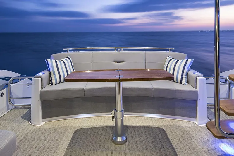 Slide: The Image of Manufacturer Provided Image: Tiara Yachts 2020 F44 Flybridge seating area with ocean view at sunset. - 36