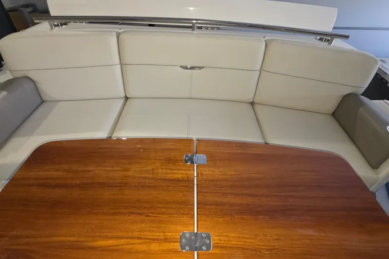 Slide: The Image of Luxurious seating and wooden table on 2020 Tiara Yachts F44 Flybridge. - 37