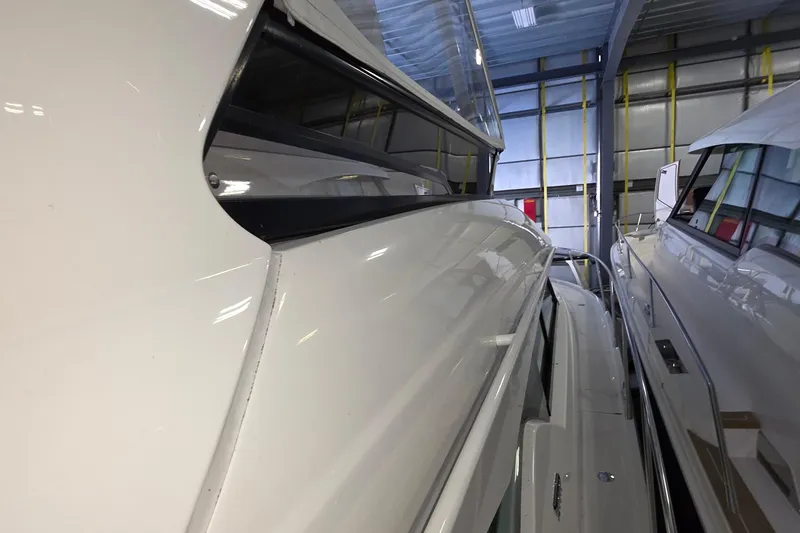 Slide: The Image of 2020 Tiara Yachts F44 Flybridge in storage, showcasing sleek design and modern features. - 45