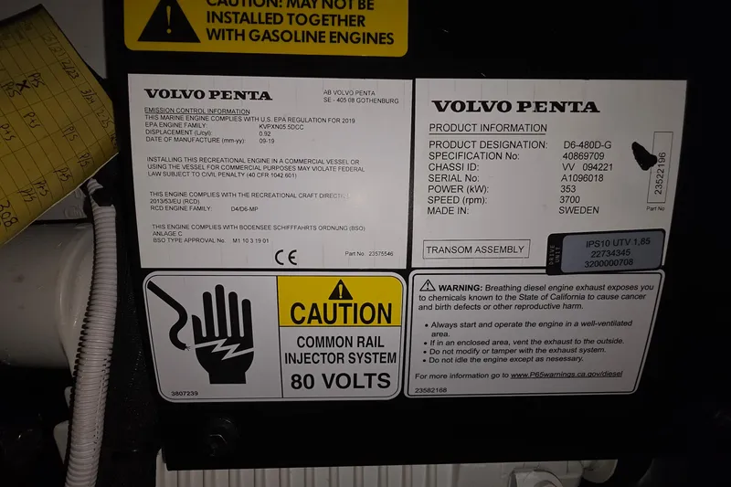 Slide: The Image of Volvo Penta engine label on 2020 Tiara Yachts F44 Flybridge, showing specifications and safety warnings. - 53
