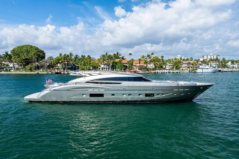 Slide: The Image of Luxurious 2013 AB 116 Motoryacht cruising near a tropical shoreline. - 0