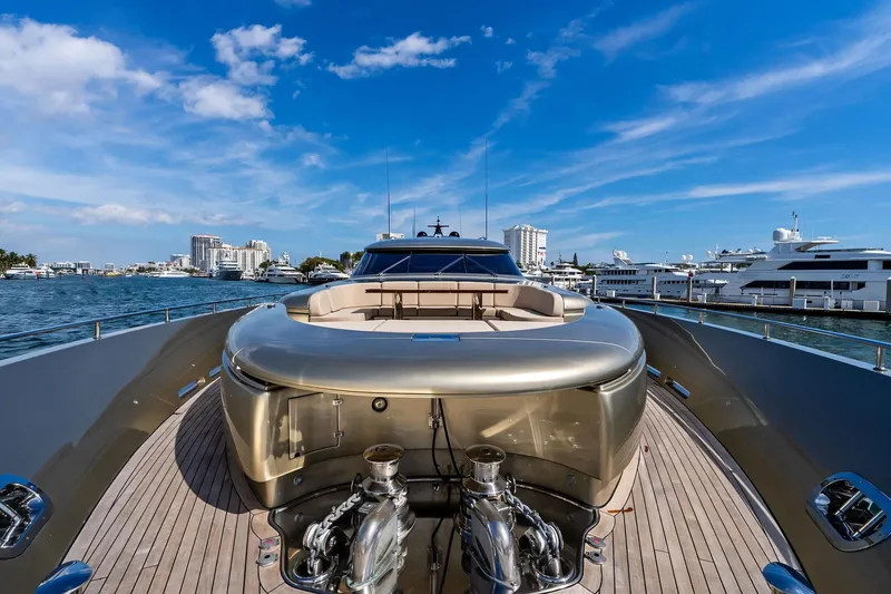 Slide: The Image of Luxurious 2013 AB 116 Motoryacht docked, showcasing sleek design and spacious deck. - 12