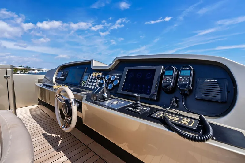 Slide: The Image of Control panel of 2013 AB 116 Motoryacht under a clear blue sky. - 15