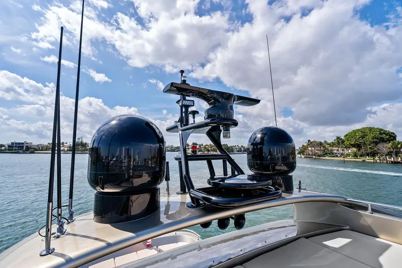 Slide: The Image of 2013 AB 116 Motoryacht radar equipment against a scenic waterfront backdrop. - 17