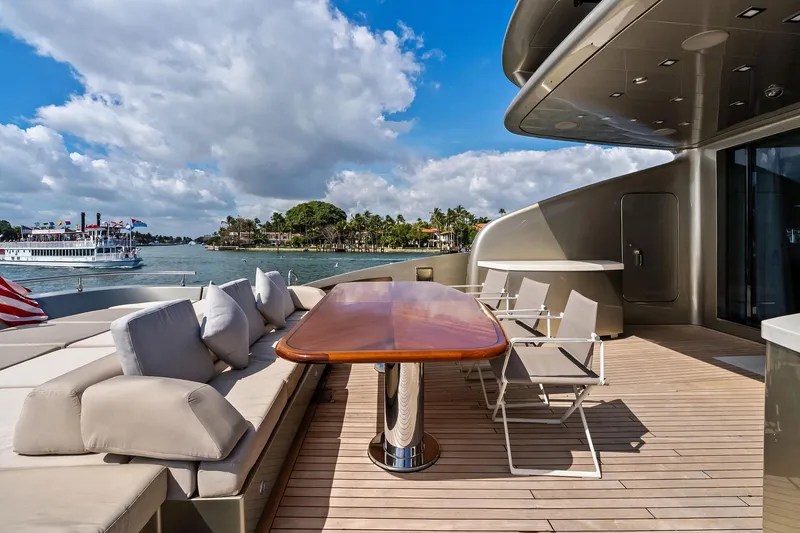 Slide: The Image of Luxurious 2013 AB 116 Motoryacht deck with elegant seating and scenic waterfront view. - 20