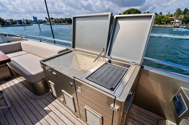 Slide: The Image of Outdoor kitchen on 2013 AB 116 Motoryacht with grill and seating, overlooking water. - 21