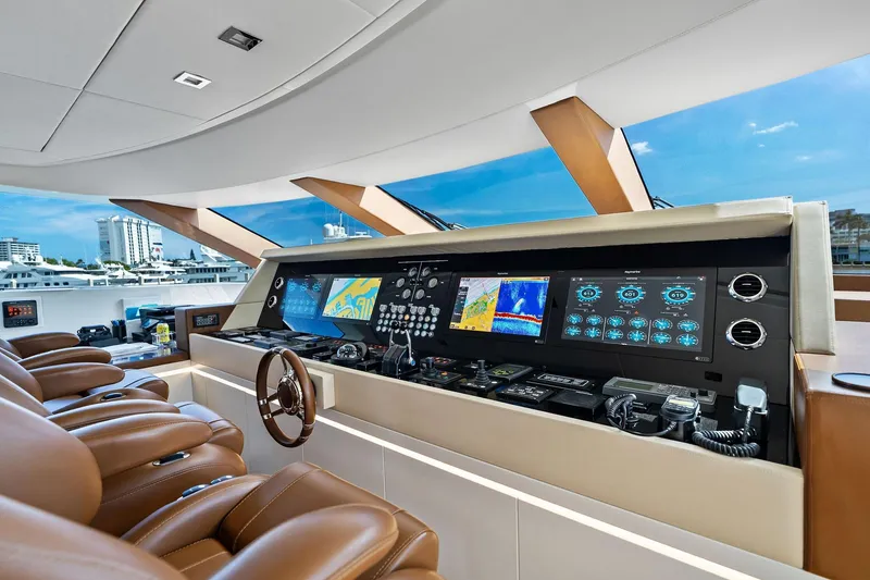 Slide: The Image of Luxurious helm of 2013 AB 116 Motoryacht with advanced navigation systems and leather seating. - 27