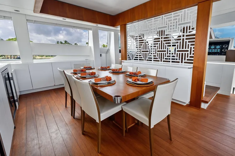 Slide: The Image of Luxurious dining area on 2013 AB 116 Motoryacht with elegant table setting and modern decor. - 28