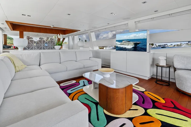 Slide: The Image of Luxurious interior of 2013 AB 116 Motoryacht with modern decor and vibrant rug. - 31
