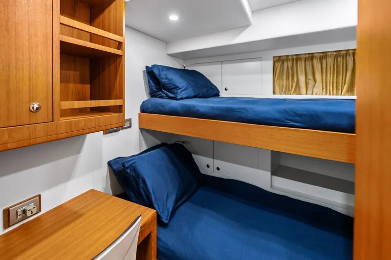 Slide: The Image of Bunk beds with blue bedding in 2013 AB 116 Motoryacht cabin interior. - 35