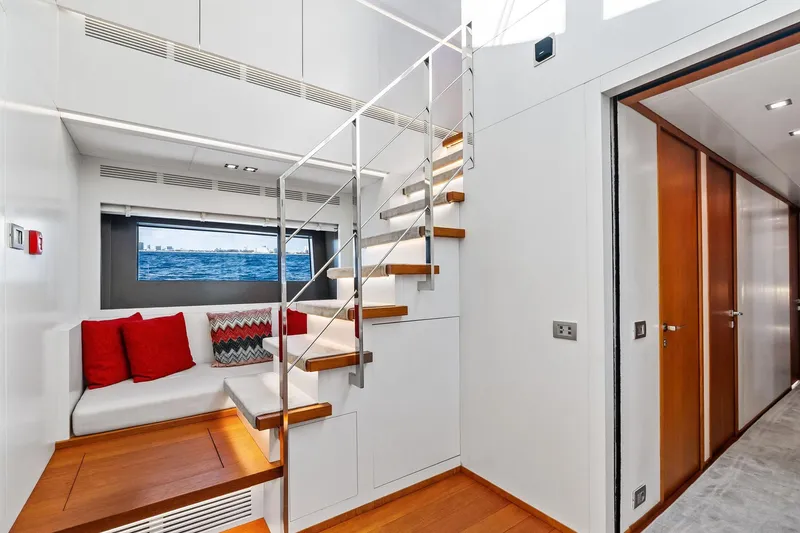 Slide: The Image of Luxurious interior of 2013 AB 116 Motoryacht with modern staircase and cozy seating area. - 45