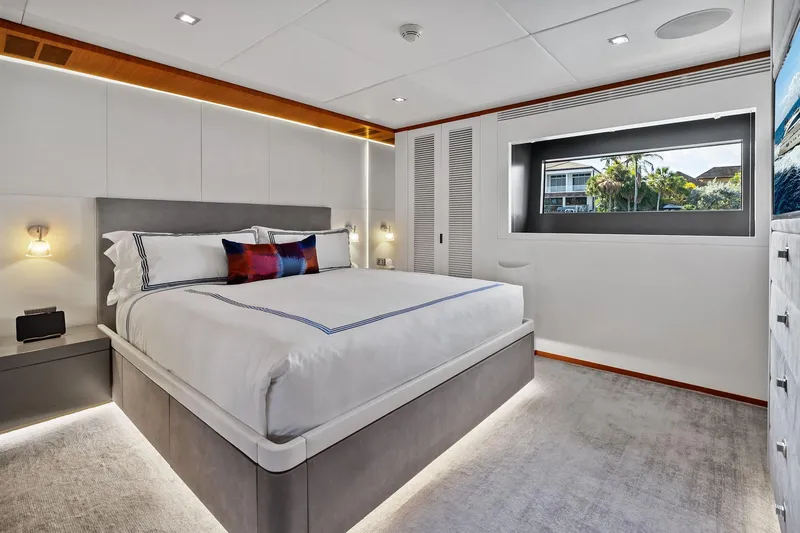 Slide: The Image of Luxurious bedroom interior on 2013 AB 116 Motoryacht, featuring modern design and large window. - 48