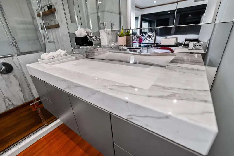 Slide: The Image of Luxurious bathroom vanity on 2013 AB 116 Motoryacht with marble countertop and modern fixtures. - 57