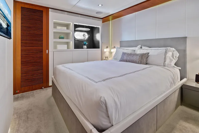 Slide: The Image of Luxurious bedroom interior on 2013 AB 116 Motoryacht, featuring elegant design and modern amenities. - 61