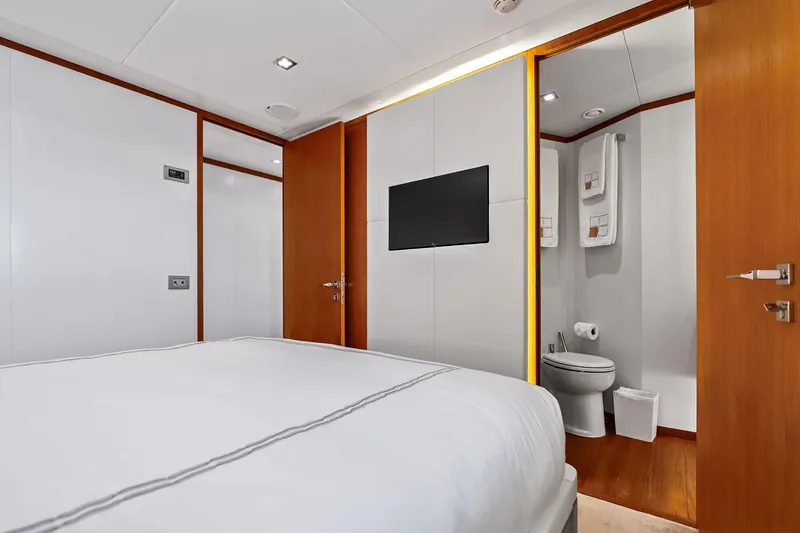 Slide: The Image of Luxurious bedroom and bathroom on 2013 AB 116 Motoryacht, featuring modern design and amenities. - 63
