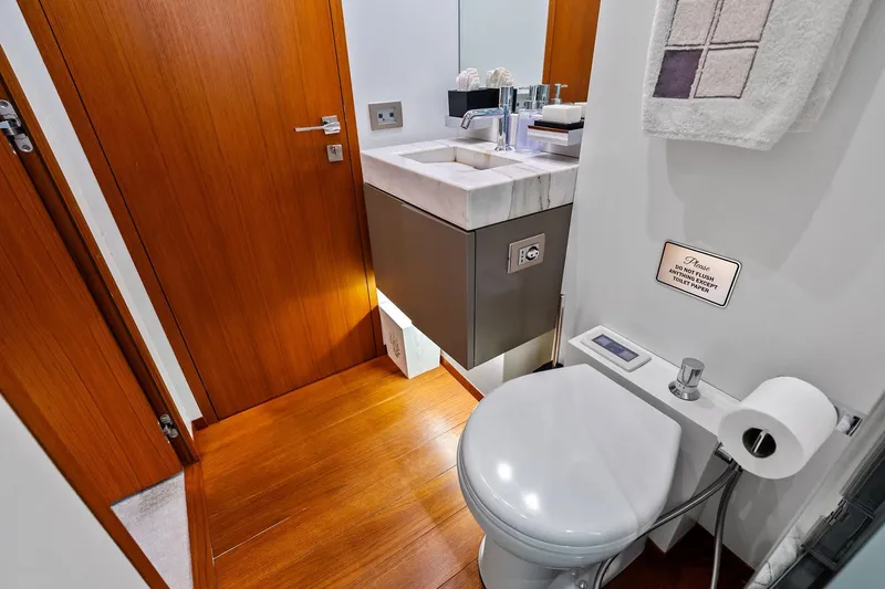 Slide: The Image of Luxurious bathroom on 2013 AB 116 Motoryacht with modern fixtures and wooden accents. - 67