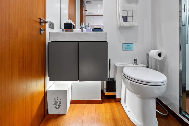 Slide: The Image of Luxurious bathroom on 2013 AB 116 Motoryacht with modern fixtures and wooden accents. - 68