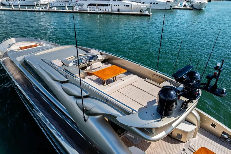 Slide: The Image of Luxurious 2013 AB 116 Motoryacht docked, showcasing sleek design and spacious deck. - 7