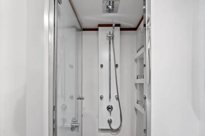 Slide: The Image of Luxurious shower in 2013 AB 116 Motoryacht, featuring sleek modern design and chrome fixtures. - 74