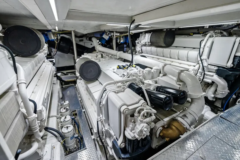 Slide: The Image of Engine room of 2013 AB 116 Motoryacht, showcasing complex machinery and components. - 76
