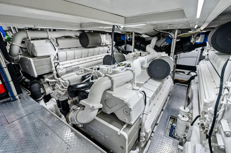 Slide: The Image of Engine room of 2013 AB 116 Motoryacht, showcasing powerful machinery and intricate components. - 77