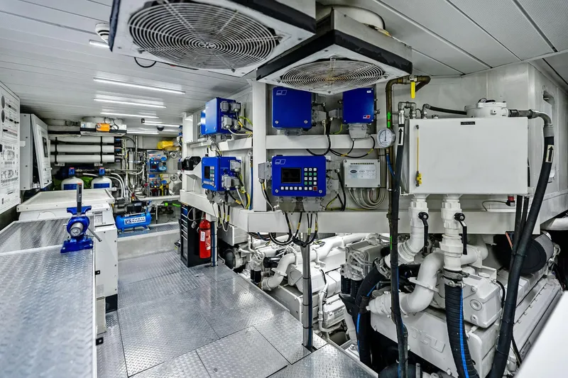 Slide: The Image of Engine room of 2013 AB 116 Motoryacht, featuring advanced machinery and control systems. - 78