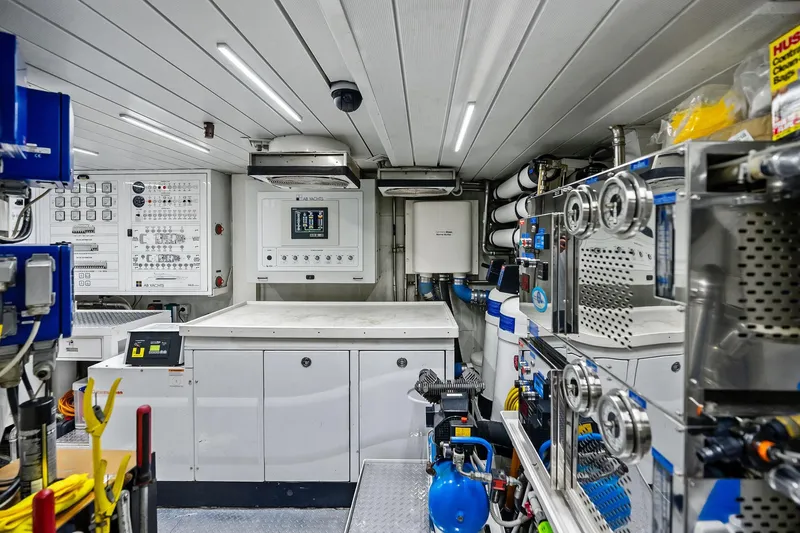 Slide: The Image of Engine room of 2013 AB 116 Motoryacht, featuring control panels and equipment. - 83