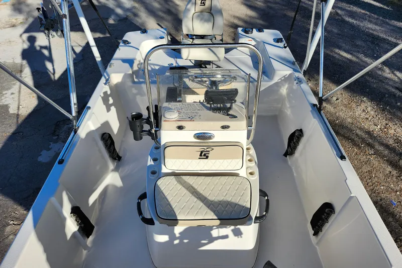 Slide: The Image of 2020 Carolina Skiff 162 JLS boat interior with console and seating. - 14