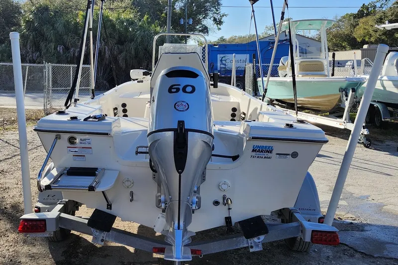 Slide: The Image of 2020 Carolina Skiff 162 JLS boat with 60 HP engine on trailer. - 7