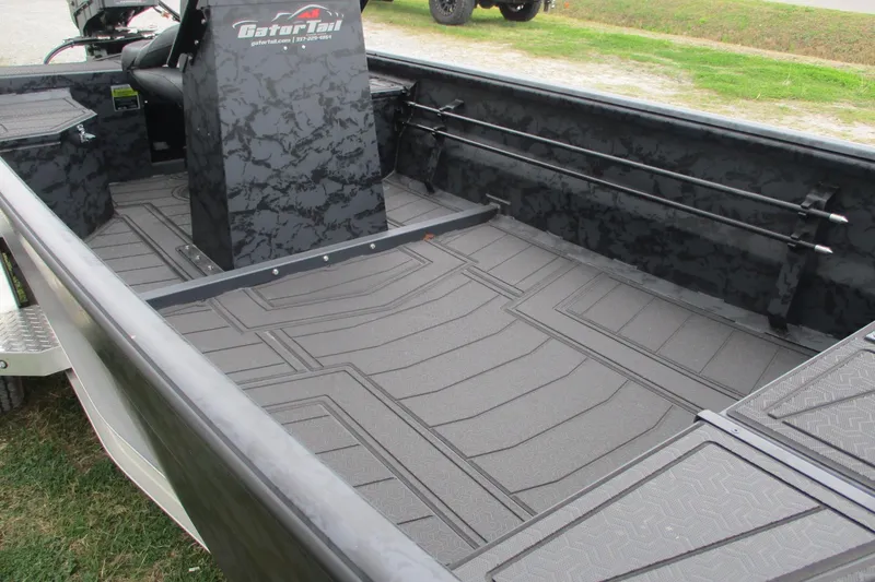 Slide: The Image of 2026 Gatortail 1860 EXTREME C.C. boat interior with textured flooring and central console. - 10