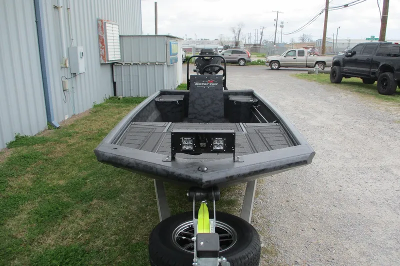 Slide: The Image of 2026 Gatortail 1860 EXTREME C.C. boat on trailer, parked outdoors. - 3