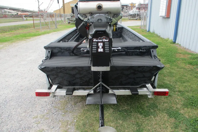 Slide: The Image of 2026 Gatortail 1860 EXTREME C.C. boat with powerful motor, parked on a trailer. - 5
