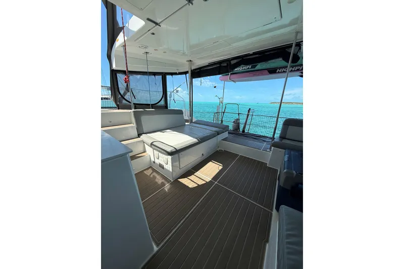 Slide: The Image of Interior view of 2016 Lagoon 450 F catamaran with ocean backdrop. - 10