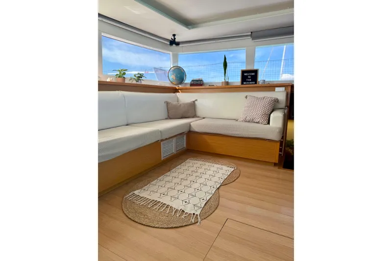 Slide: The Image of Interior of Lagoon 450 F yacht, cozy seating area, 2016 model. - 18