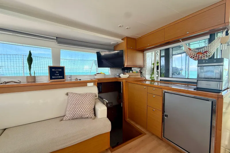 Slide: The Image of Interior of 2016 Lagoon 450 F yacht with modern kitchen and ocean view. - 20