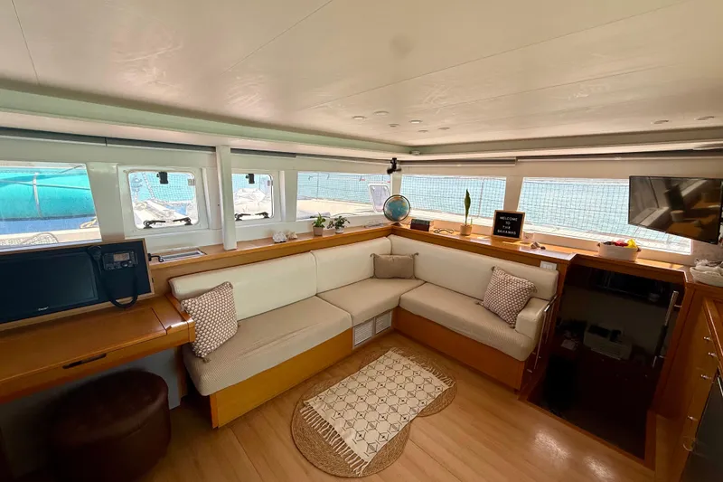 Slide: The Image of Luxurious interior of 2016 Lagoon 450 F catamaran with cozy seating and modern amenities. - 23