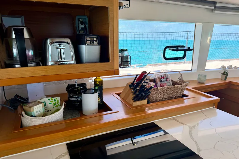 Slide: The Image of Modern kitchen interior on 2016 Lagoon 450 F yacht with ocean view. - 33