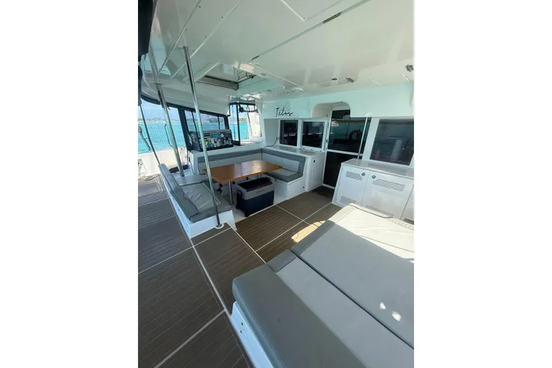 Slide: The Image of Spacious interior of 2016 Lagoon 450 F catamaran with seating and table. - 9