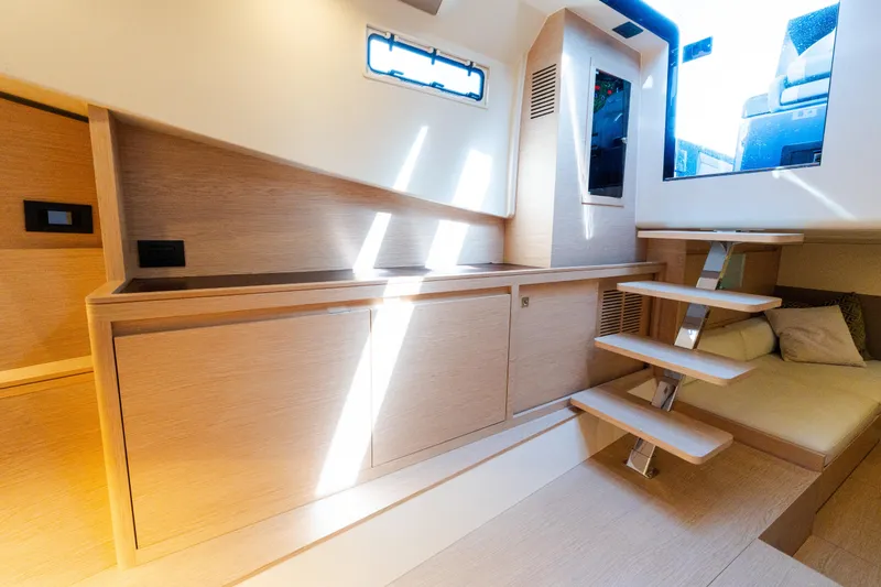 Slide: The Image of Luxurious interior of 2023 Solaris Power 44 Open yacht with modern wooden design. - 104