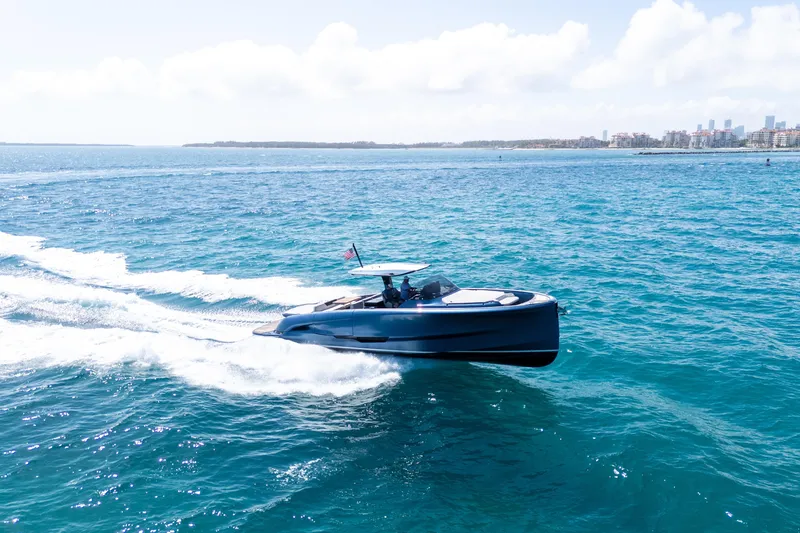 Slide: The Image of 2023 Solaris Power 44 Open yacht cruising on blue ocean waters. - 18