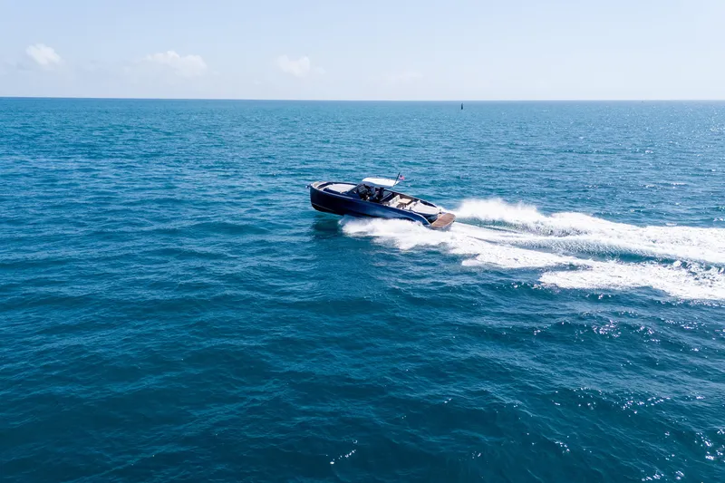 Slide: The Image of 2023 Solaris Power 44 Open yacht cruising on open sea under clear skies. - 23