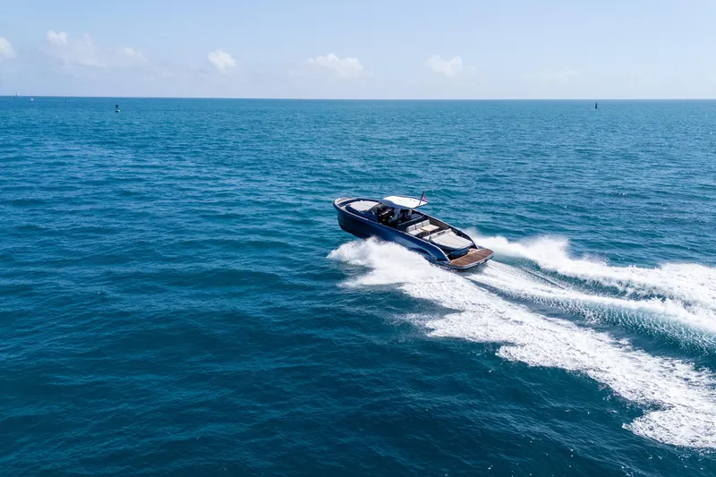 Slide: The Image of 2023 Solaris Power 44 Open yacht cruising on open blue sea. - 24